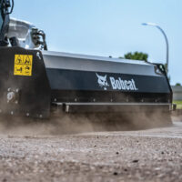 Bobcat Sweeper Attachment in action