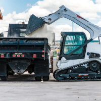 Bobcat T870 Compact Track Loader loads a truck