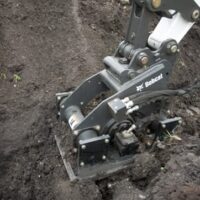 Plate Compaction Attachment in action